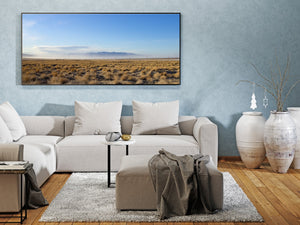 Wide blue sky above an open California plain