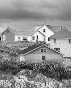 Overlapping wooden houses and pitched roofs in a Nova Scotia coastal village