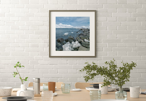 Rocks along the Antarctica Southern Shore with mountains in the distance | Photo Art Print fine art photographic print
