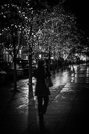 Shadowy figure of a woman walks alone on the streets of New York City | Photo Art Print fine art photographic print