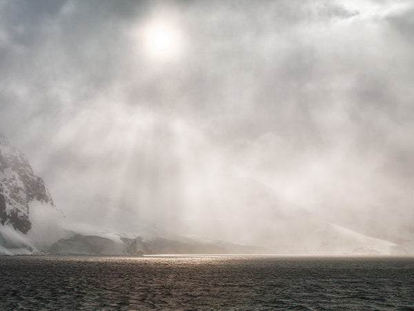 Sun breaks through the blowing snowstorm in the Antarctic | Photo Art Print fine art photographic print