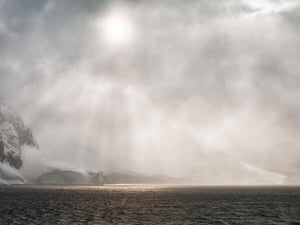 Sun breaks through the blowing snowstorm in the Antarctic | Photo Art Print fine art photographic print
