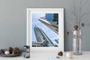 Upward architectural photograph of Toronto towers and a glass atrium