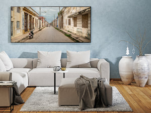 Woman cycling down the street in Cuba | Photo Art Print fine art photographic print