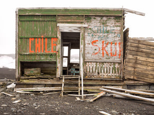 Wooden building with the word Chile at Whalers Bay Station Antarctica | Photo Art Print fine art photographic print