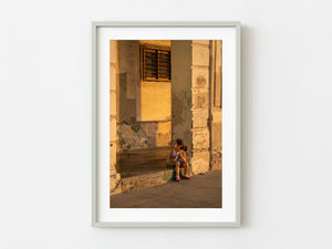 Beautiful sunset light on little girl eating a sandwich in Havana Cuba | Photo Art Print fine art photographic print