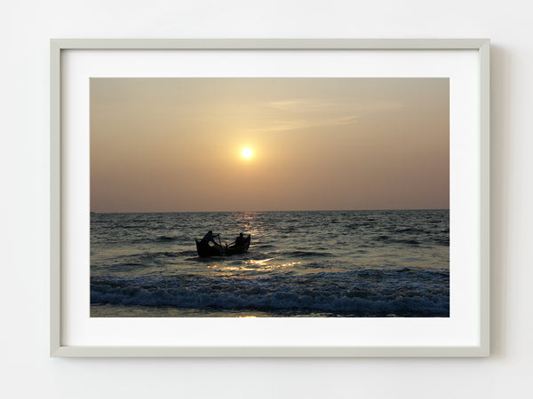 Fishermen pushing off to sea at sunset Pollenthai Beach India | Photo Art Print fine art photographic print