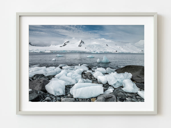 Frozen ice on the rocky Antarctica shore | Photo Art Print fine art photographic print