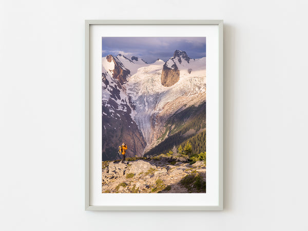 Hiker photographing the receding glaciers in the Rocky Mountains | Photo Art Print fine art photographic print