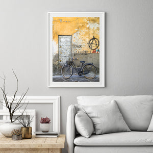 Detail of weathered wall and old-style bicycle in Rome