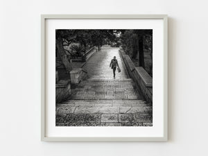 Lady is walking up the apartment building laneway in Dubrovnik | Photo Art Print fine art photographic print