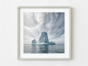 Large iceberg in Antarctica with whispy clouds | Photo Art Print fine art photographic print