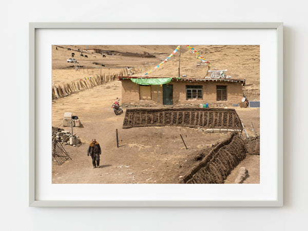 Man walking on driveway in Northern China | Photo Art Print fine art photographic print