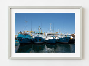 Modern fishing boat tied together in a commercial marina | Photo Art Print fine art photographic print