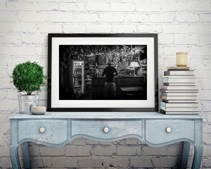 Night scene in Cuba with bartender