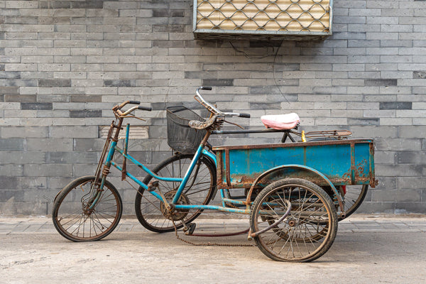 Old abandoned bicycles against a wall in Beijing China | Photo Art Print fine art photographic print