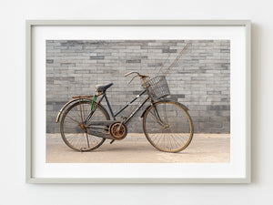 Old abandoned rusted bike against a wall in Beijing China | Photo Art Print fine art photographic print