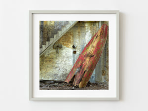 Red Rowboat Against Wall | Photo Art Print fine art photographic print