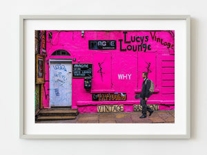 Retro man walking bast grungy pink building | Photo Art Print fine art photographic print