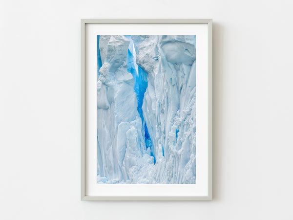Snow and ice wall with deep blue crevasses in Antarctica | Photo Art Print fine art photographic print