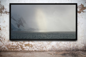 Sun breaks through the blowing winter storm in the Antarctic landscape | Photo Art Print fine art photographic print