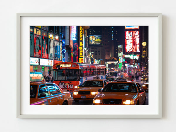 Taxis and busses on New York City streets at night in 2005 | Photo Art Print fine art photographic print