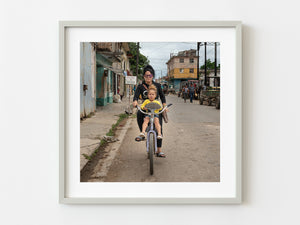 Woman and her daughter bike riding in Santa Marta Cuba | Photo Art Print fine art photographic print