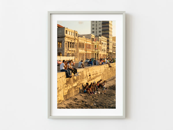 Young kids enjoying the sunset over the harbor | Photo Art Print fine art photographic print