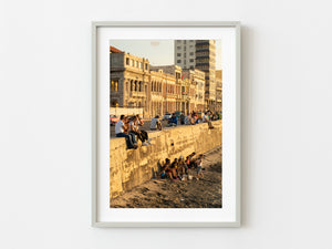 Young kids enjoying the sunset over the harbor | Photo Art Print fine art photographic print